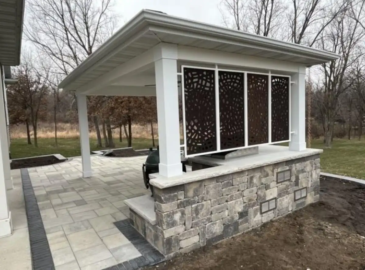 Layered planting beds and lawn at a completed Cedar Valley landscape